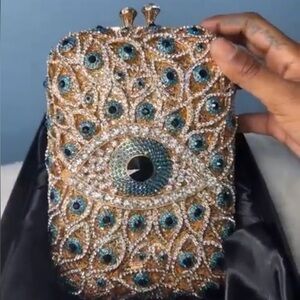 Evil eye clutch